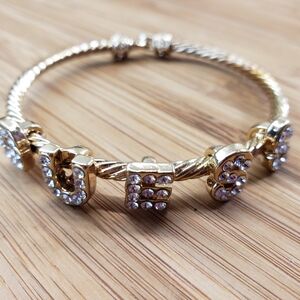 Guess Logo Gold Tone Rhinestone Bangle Bracelet